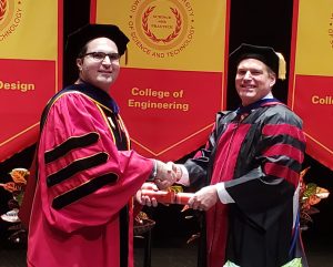 Ramin Giahi and Cameron Mackenzie at graduation