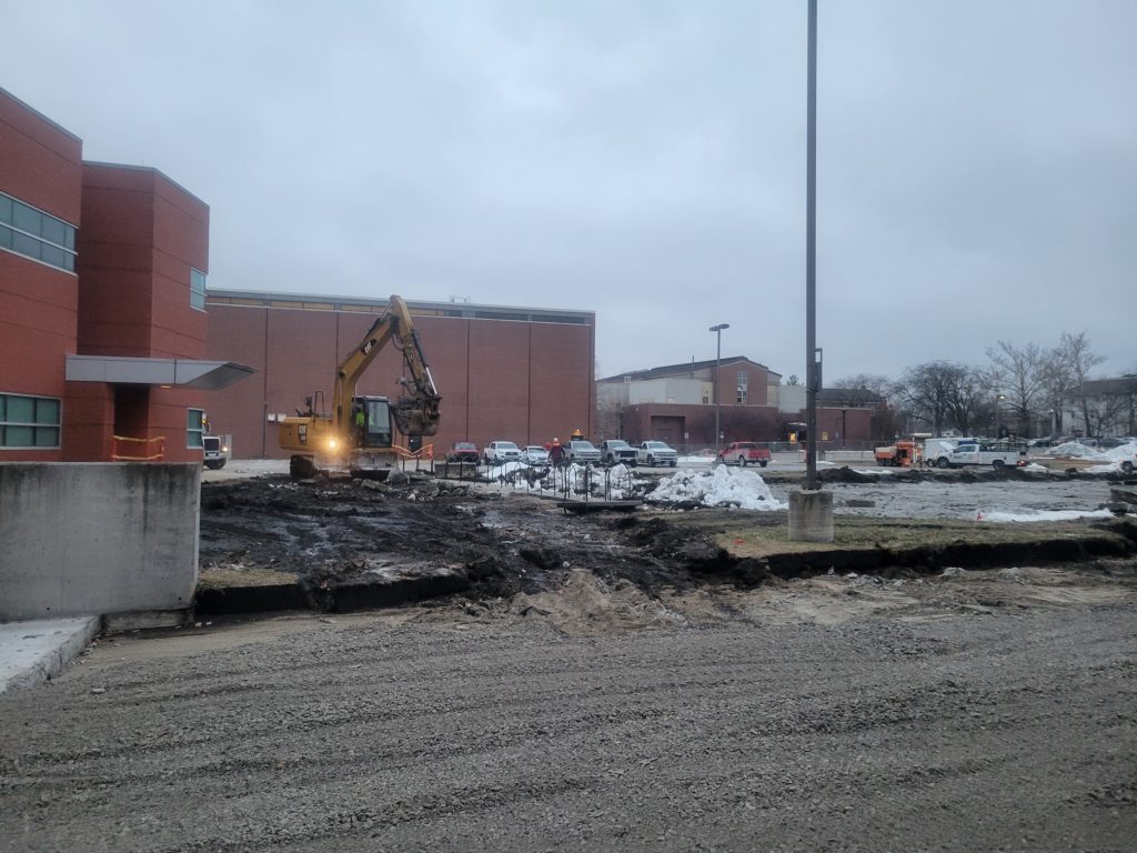 concrete demolition begins with heavy equipment