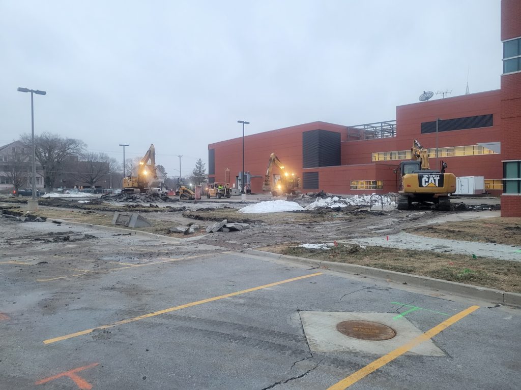 concrete demolition begins with heavy equipment