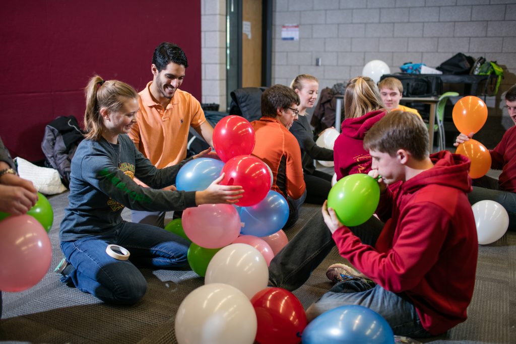 students filling ballons