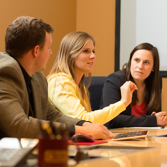 student interaction at conference room table