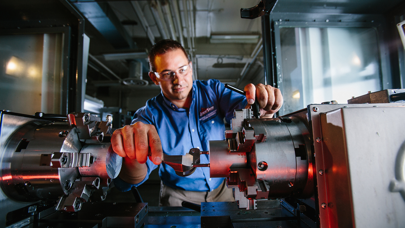 researcher tests lab equipment