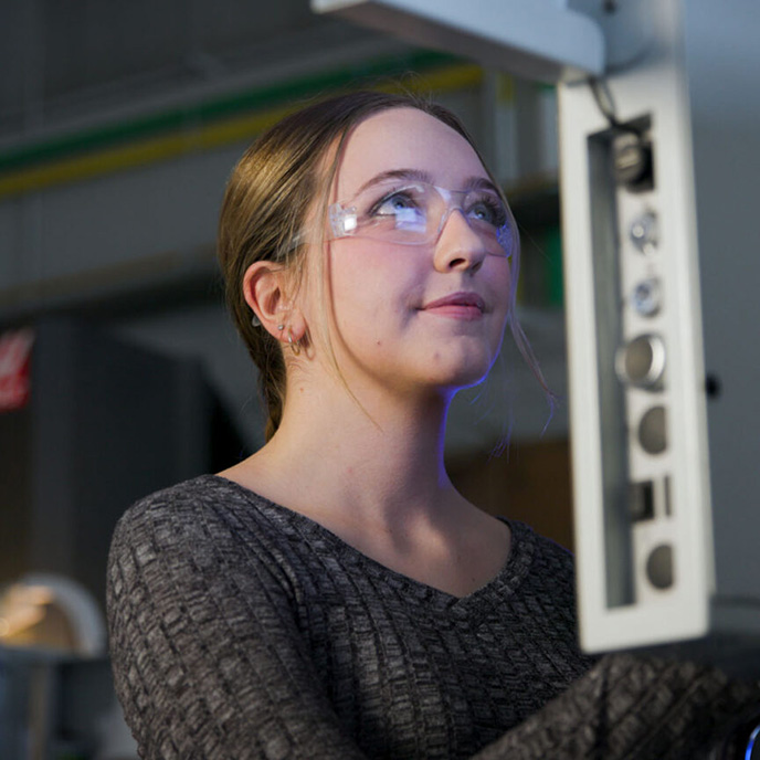 female student in lab setting