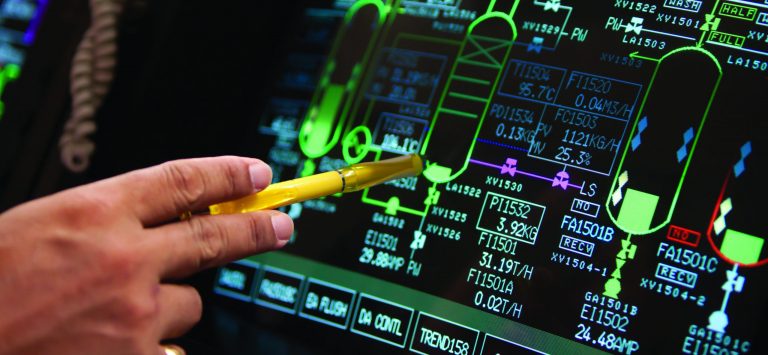 A hand pointing at a computer-generated diagram.